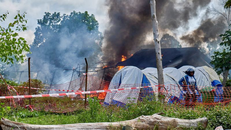 Protesters set Ebola treatment center on fire in DRC, demanding return of body